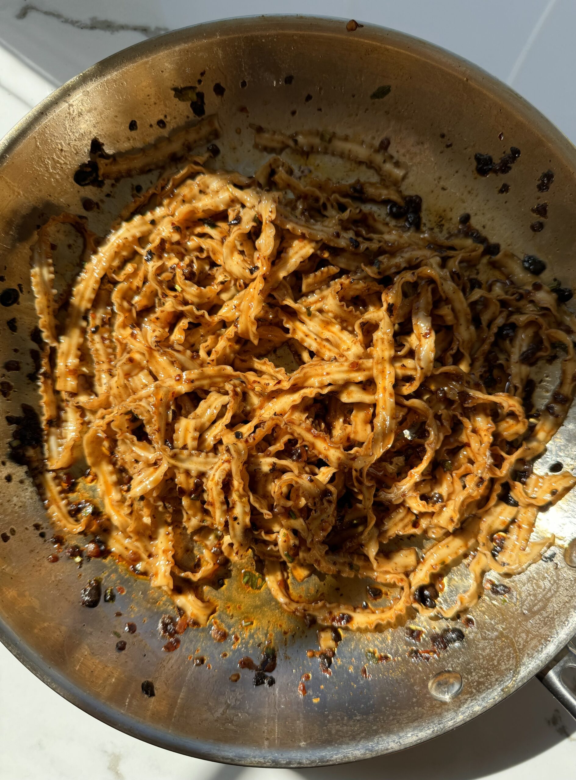 Creamy Tomato Chili Crisp Noodles with Golden Garlic Chips
