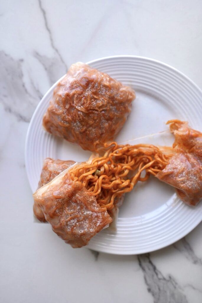 Cheesy Rice Paper Dumplings with Spicy Buldak Noodles