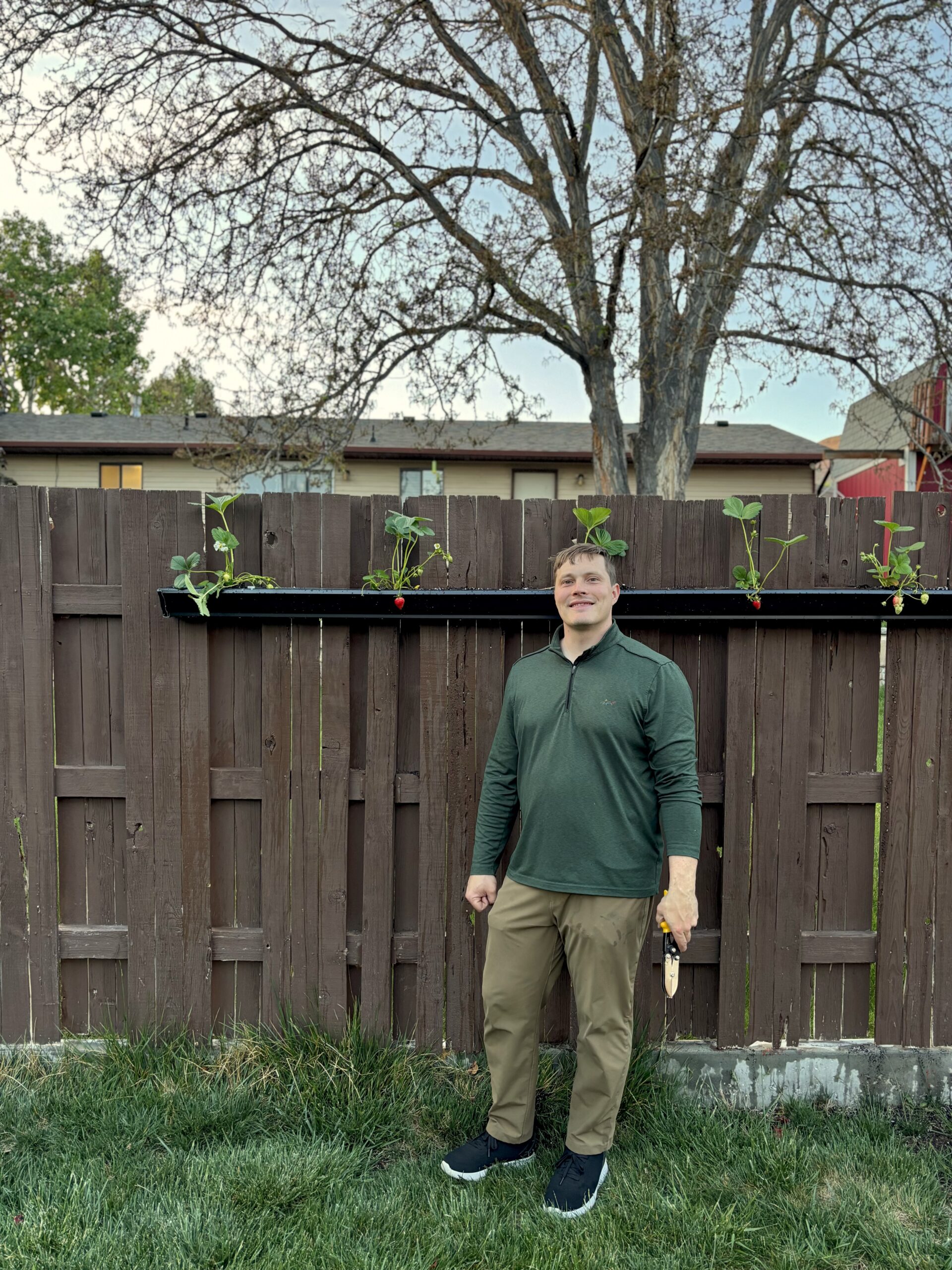 How to Build a Gutter Garden on a Fence